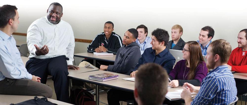 jason williams in class with students